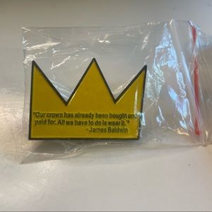A James Baldwin pin.
